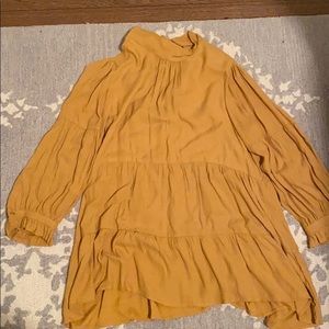 Anthro tiered tunic tie back top size M